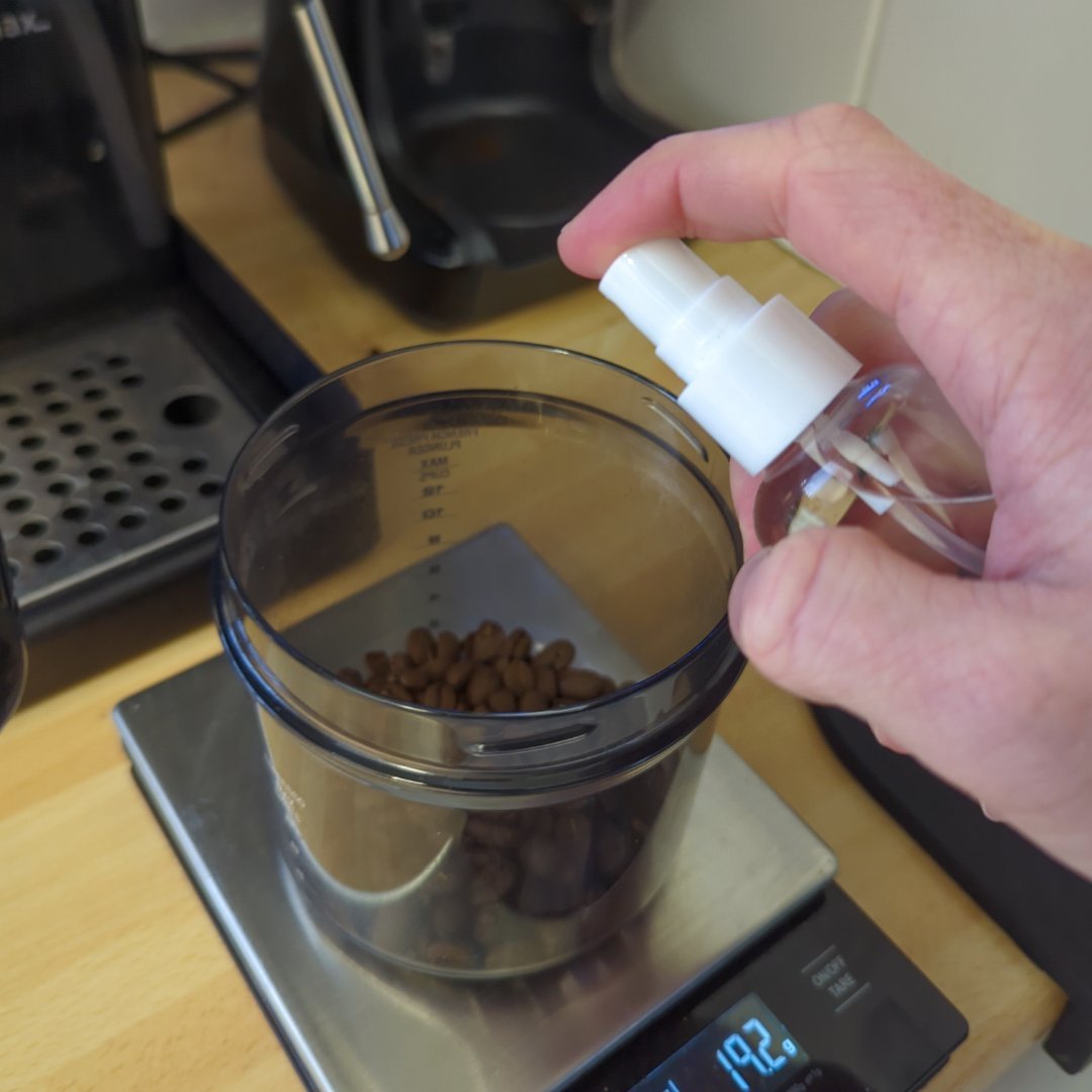 Should You Spray Coffee Beans Before Grinding?